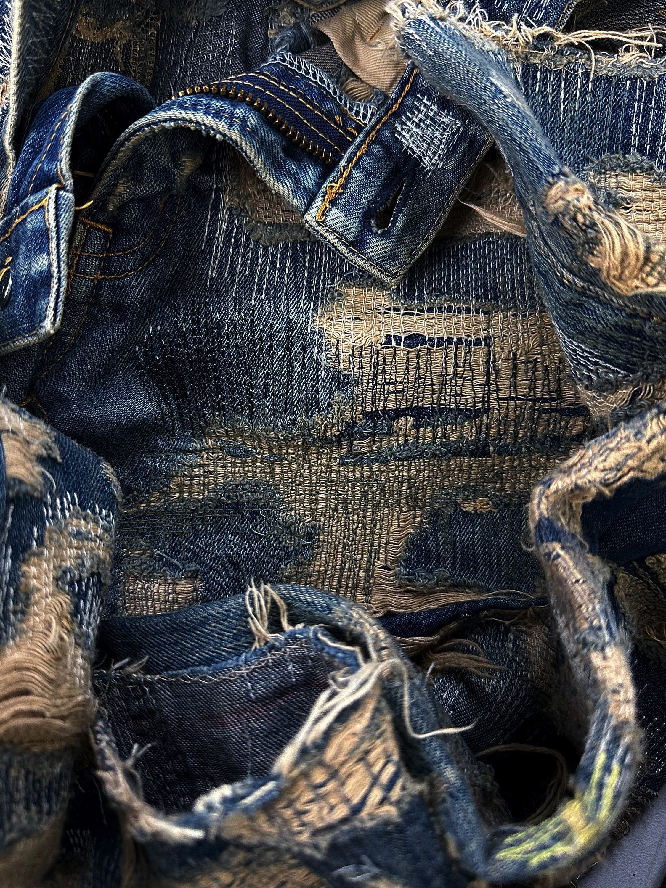 Close-up of distressed denim textile